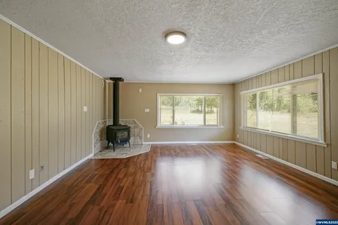Ranch house family room with wood stove